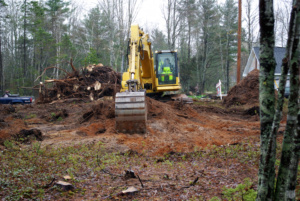 A excavator used to grub of a building lot