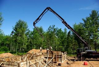 A concrete pumper used for placing concrete in the forms