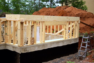 A picture showing a pony wall and a rim joist.