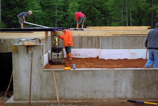 A picture showing the compaction of a garage floor